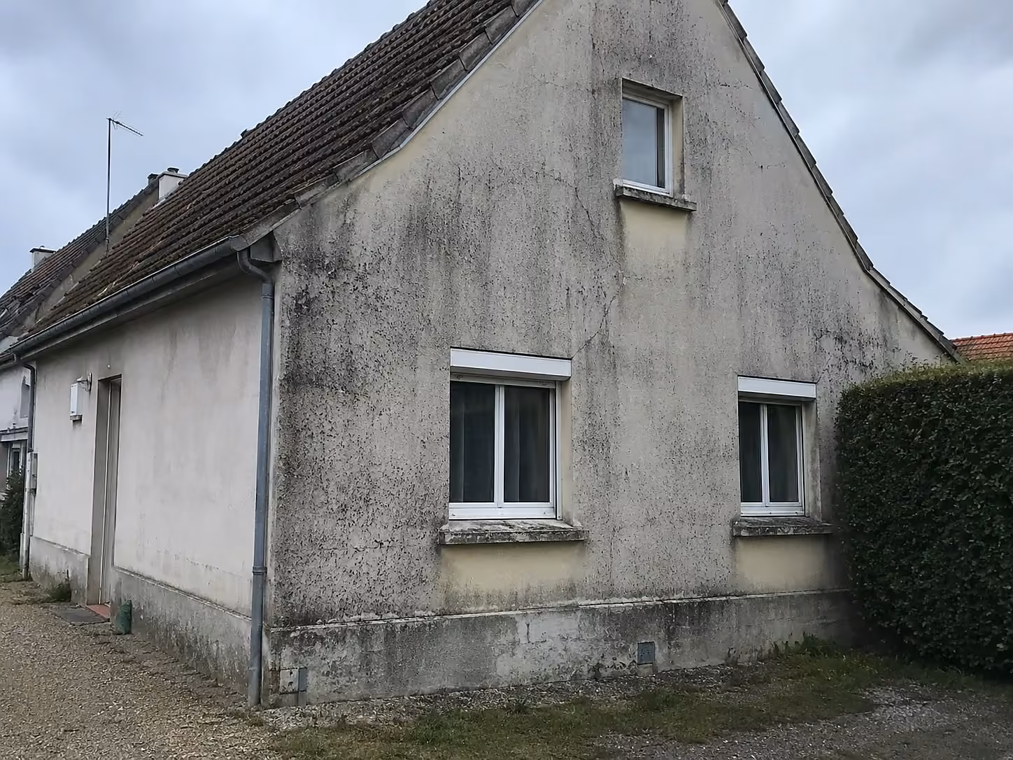 Pignon de brique avant ravalement